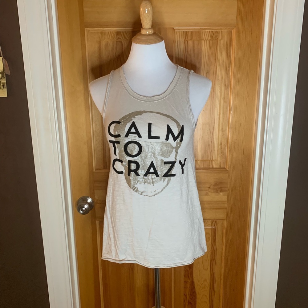 Calm to Crazy graphic muscle tee.